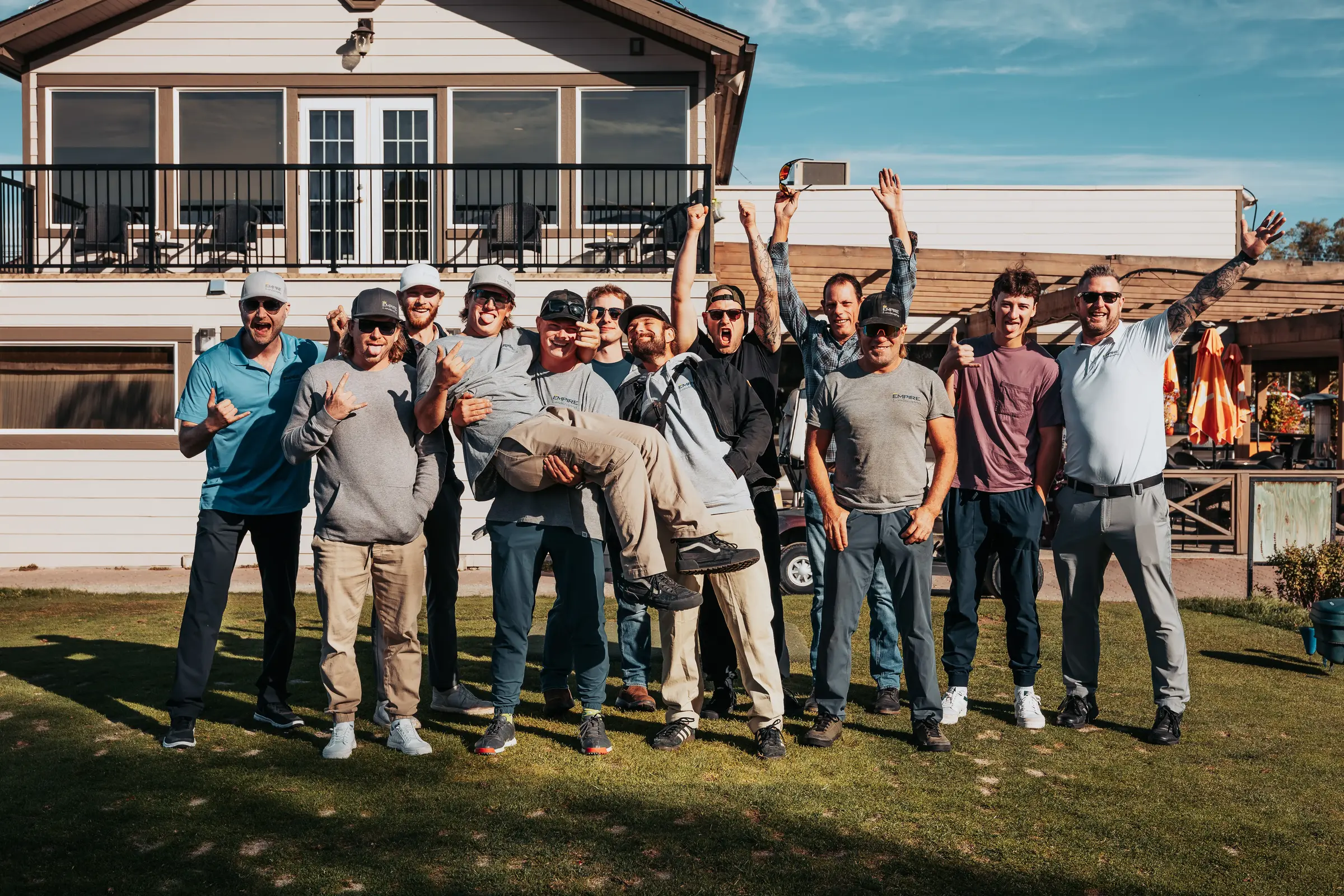 Empire landscaping Ltd team posing after a round of golf