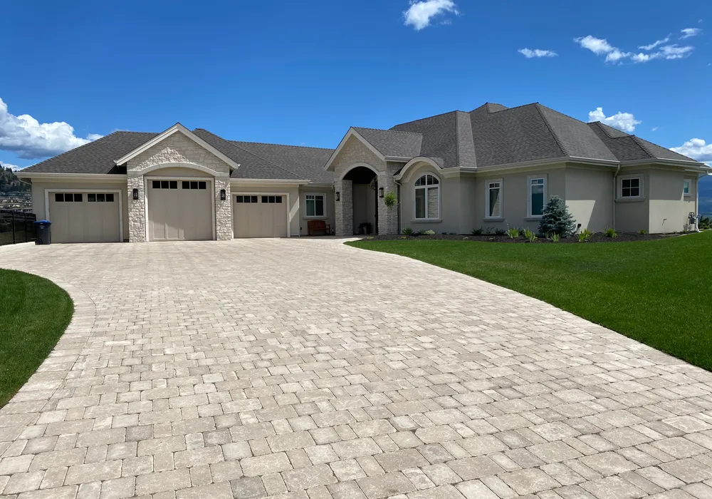 driveway paver stone and modern home
