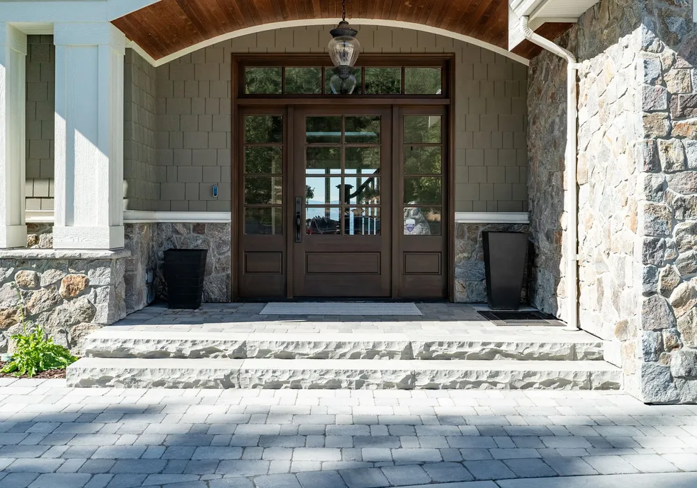 modern doorway and stairs and paver stones