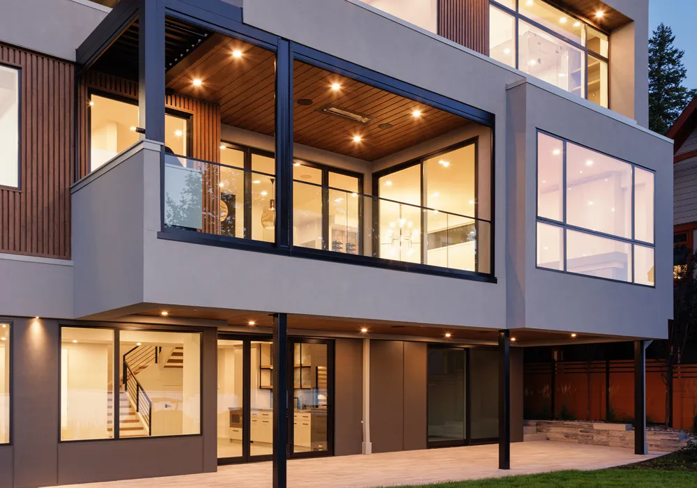 modern home night sky and stone walkway