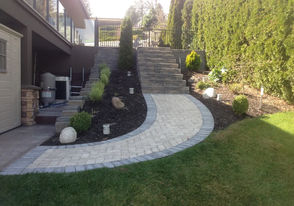 stairs and mulch with paver stone walkway