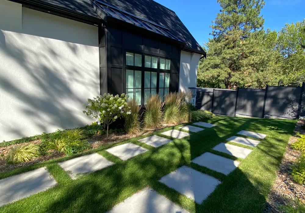 walkway stones and green grass