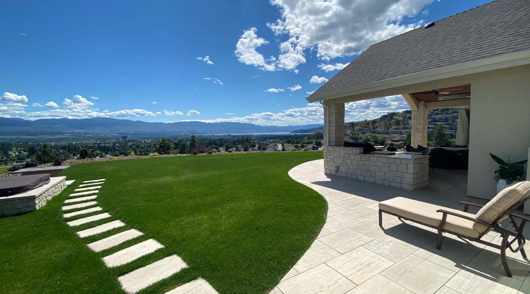 paver stone flooring with a walkway and a view