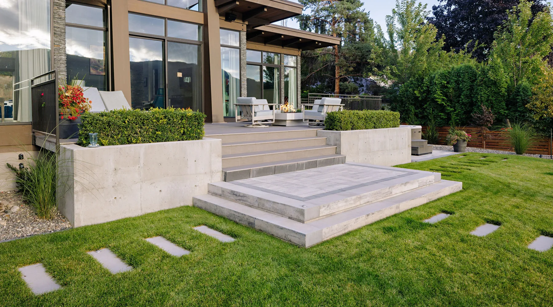 retaining wall walkway and shrubs with stairs