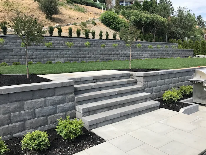 Retaining wall and stairs by Empire Landscaping.